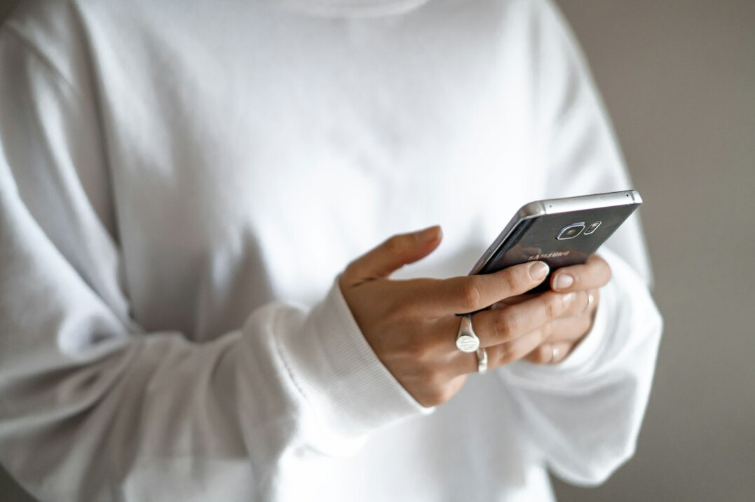 person using insurance app