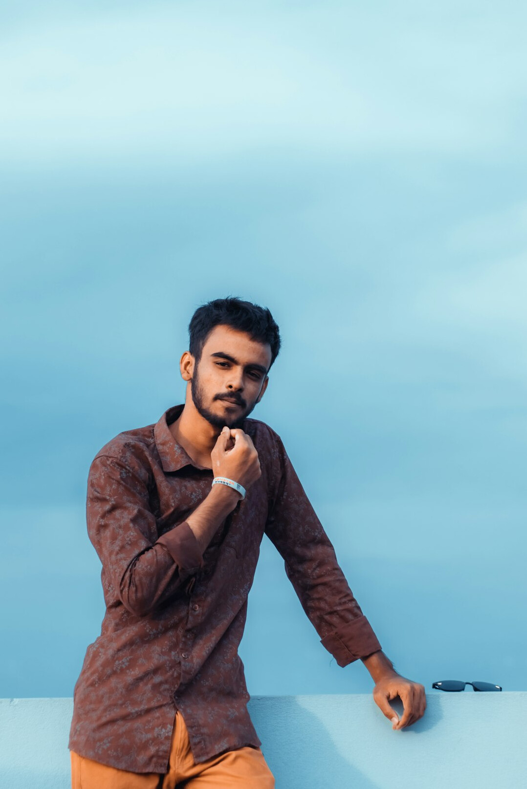 Portrait of a bearded man in casual shirt