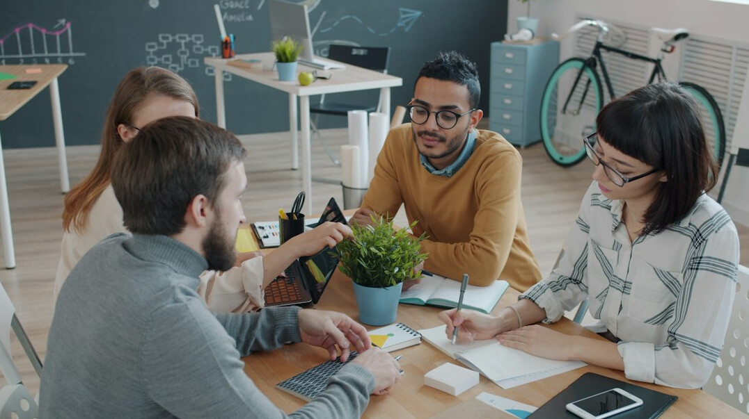 team discussing insurance strategy